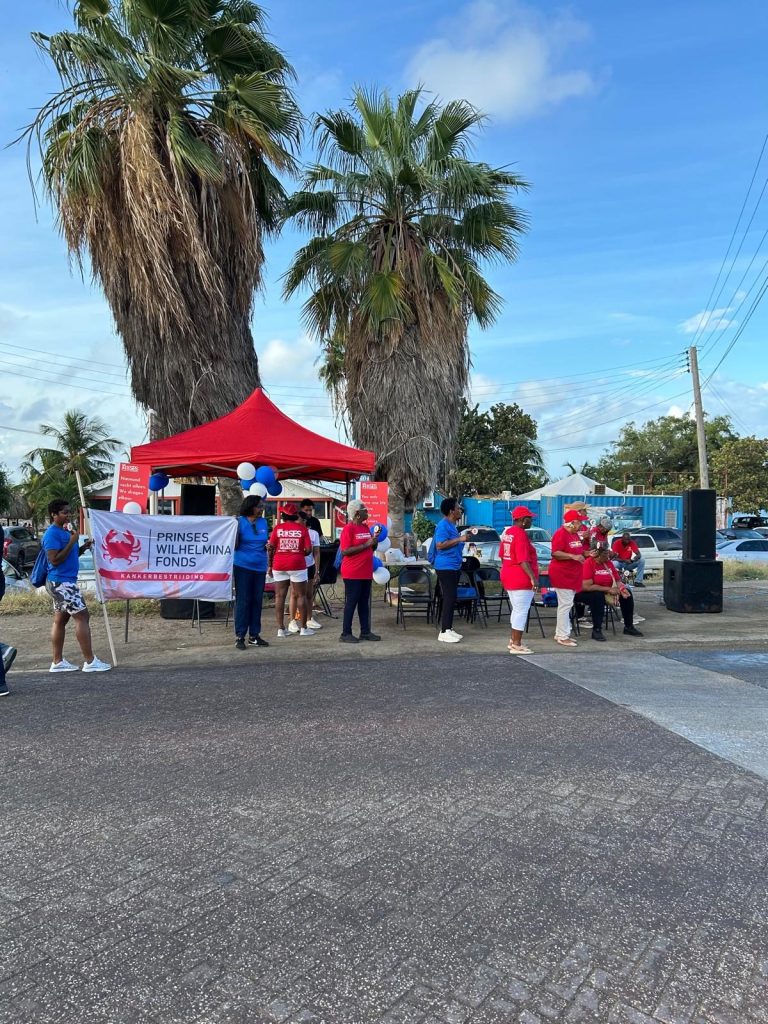 Volunteers gathered at the PWF tent along the Ride for the Roses route